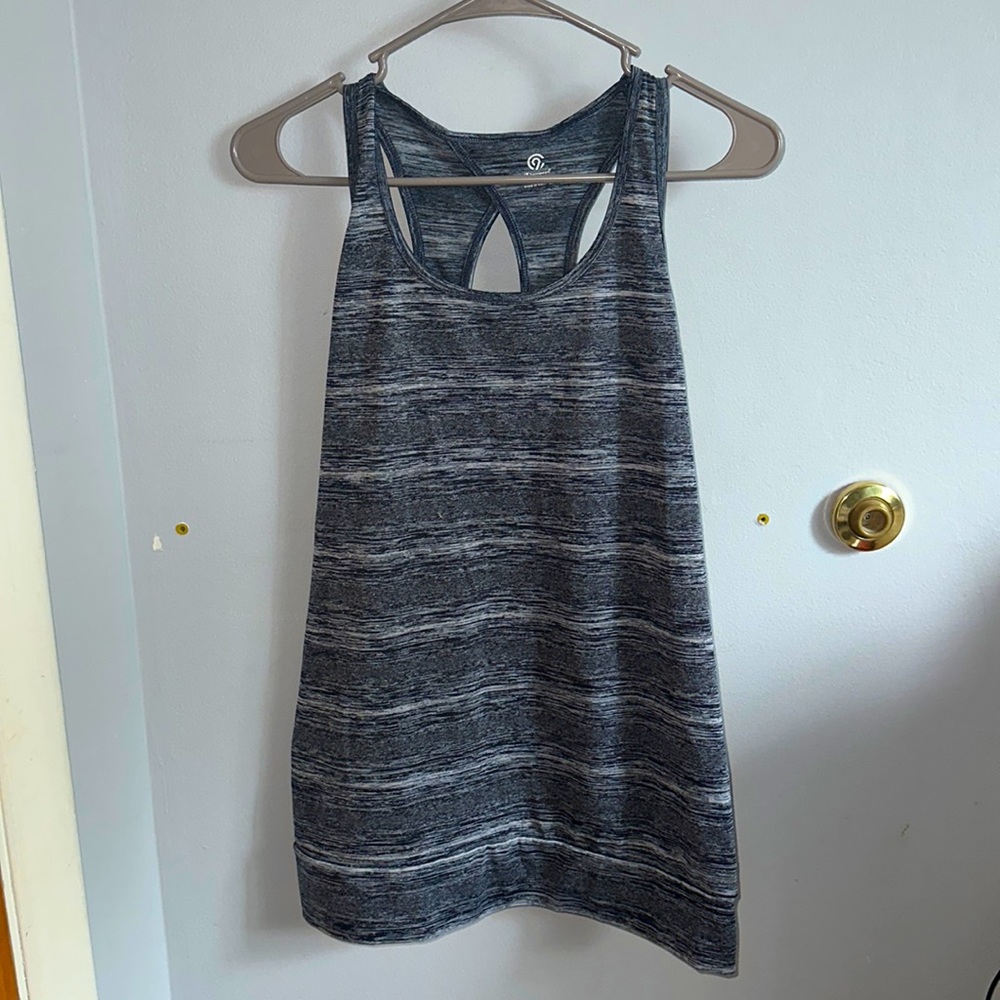 Cute king-ish tank top. Polyester martirial, breathable.